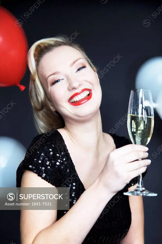 Woman holding champagne glass