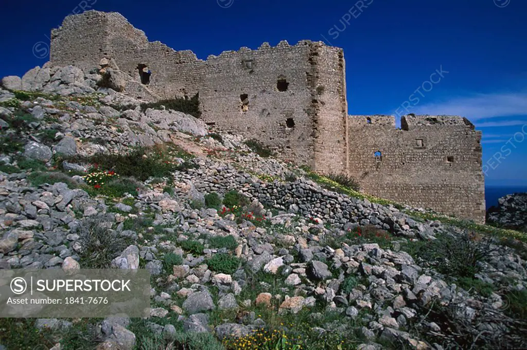 Pile of stones near old ruins of building, Rhodes, Dodecanese Islands, Greece