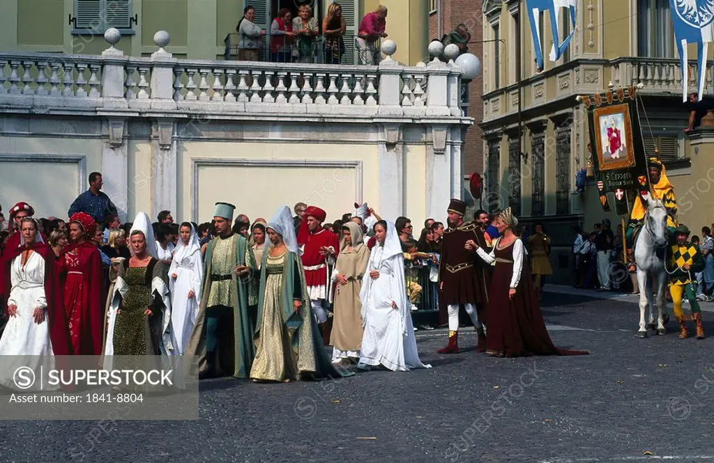 People in costumes during festival, Asti, Piedmont, Italy
