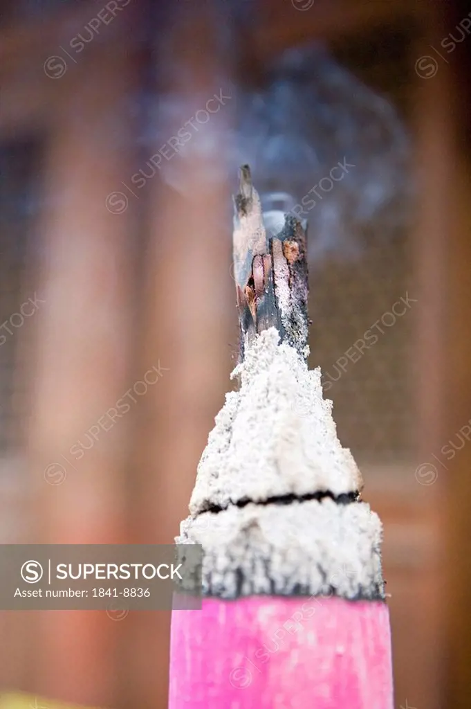 Close_up of burning incense