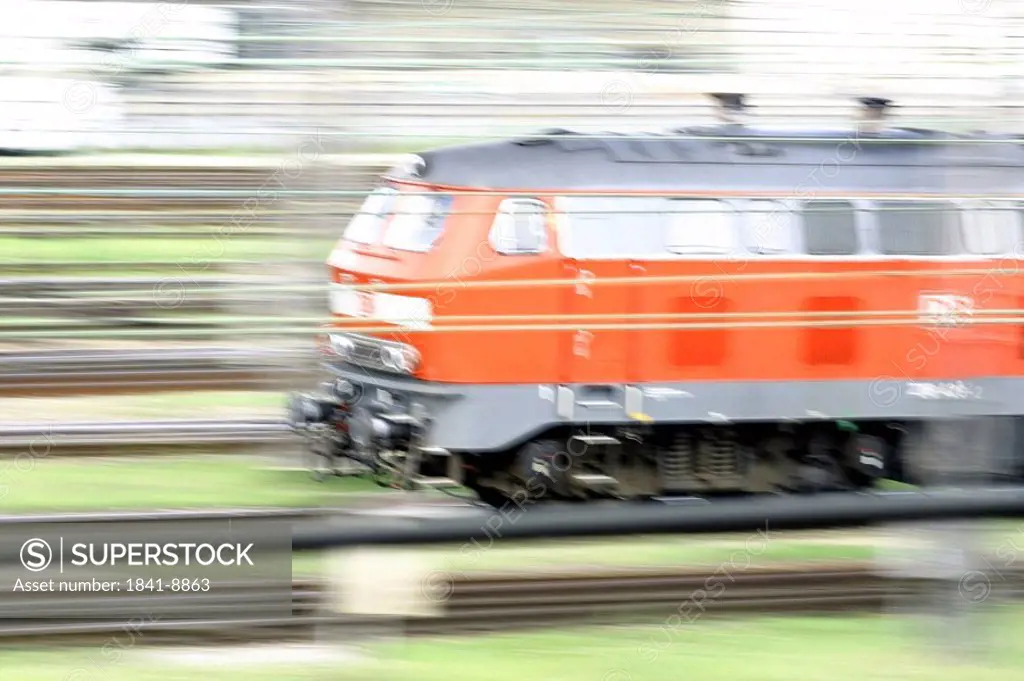 Blurred view of train engine on track, Germany