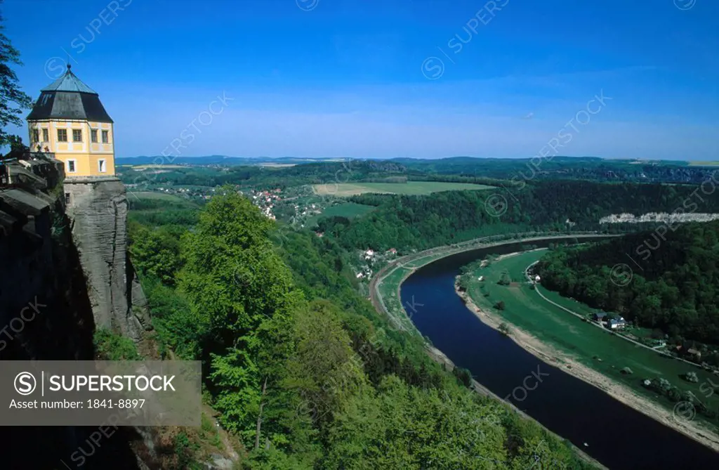 Building on a cliff overlooking a river, Saxony, Germany