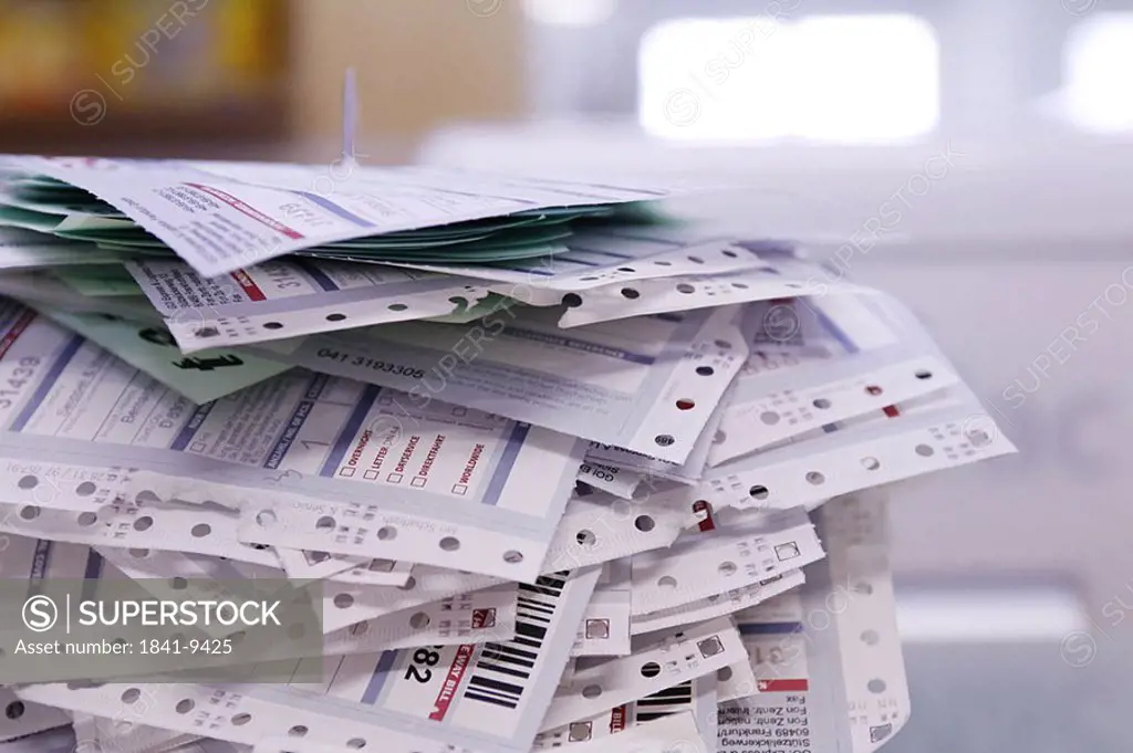 Close_up of stacked receipts
