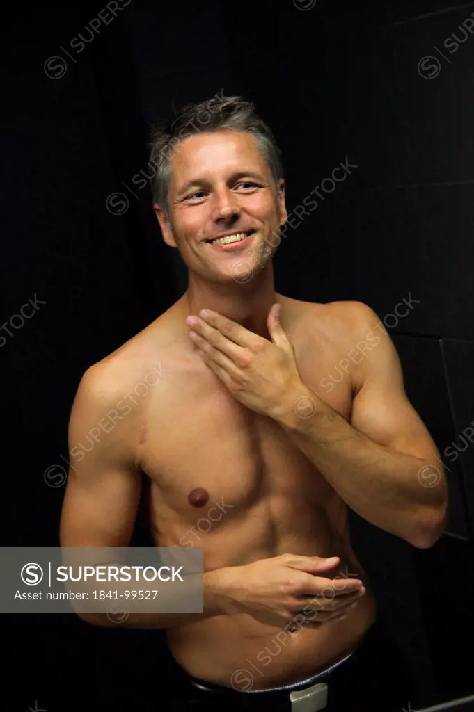 Man applying aftershave