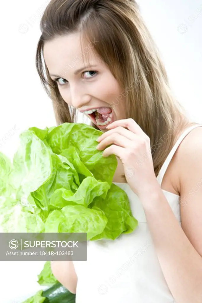 young woman with lettuce