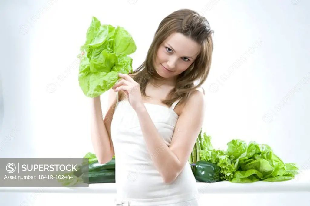 young woman with lettuce