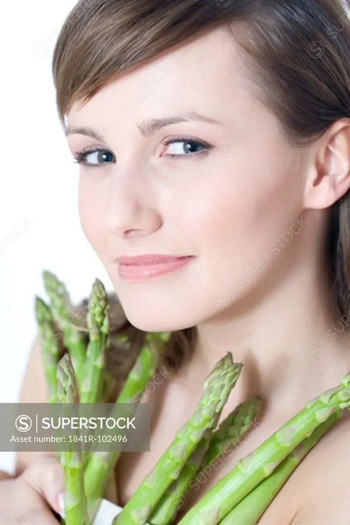 young woman with asparagus