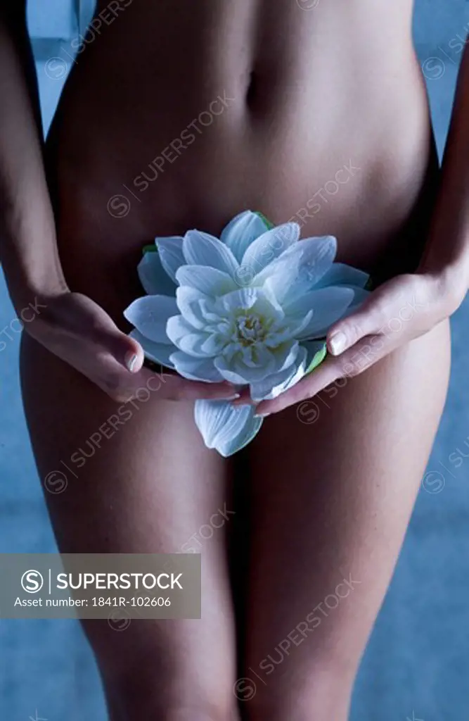 nude woman with flower