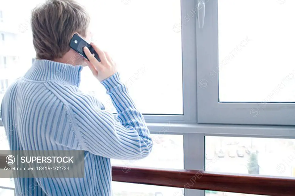 man using cell phone
