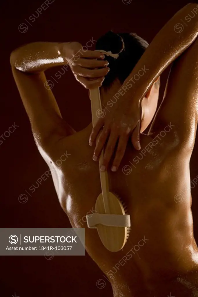 woman massaging back