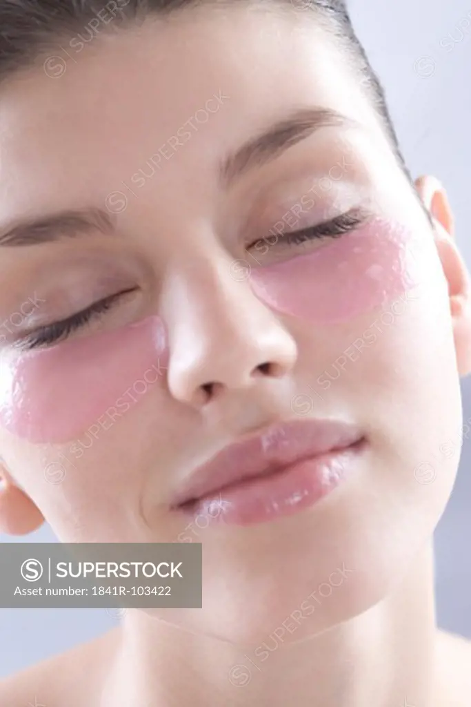 young woman with eye mask