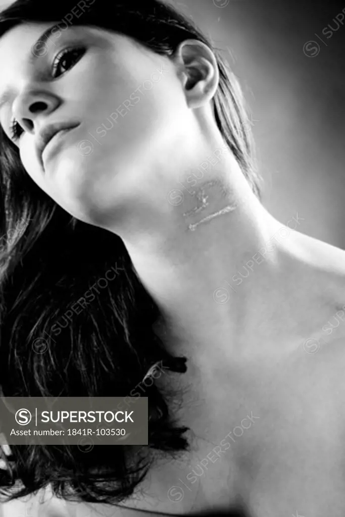 woman with libra sign on neck