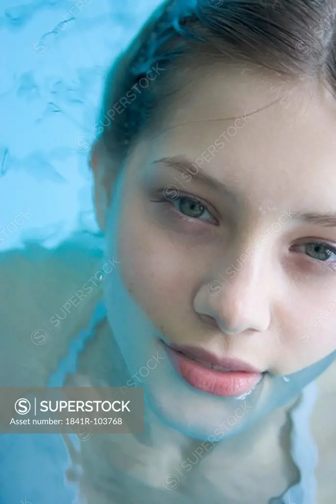 young woman in the swimming pool