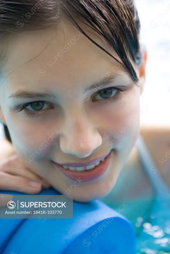 close-up of young woman in swimming pool