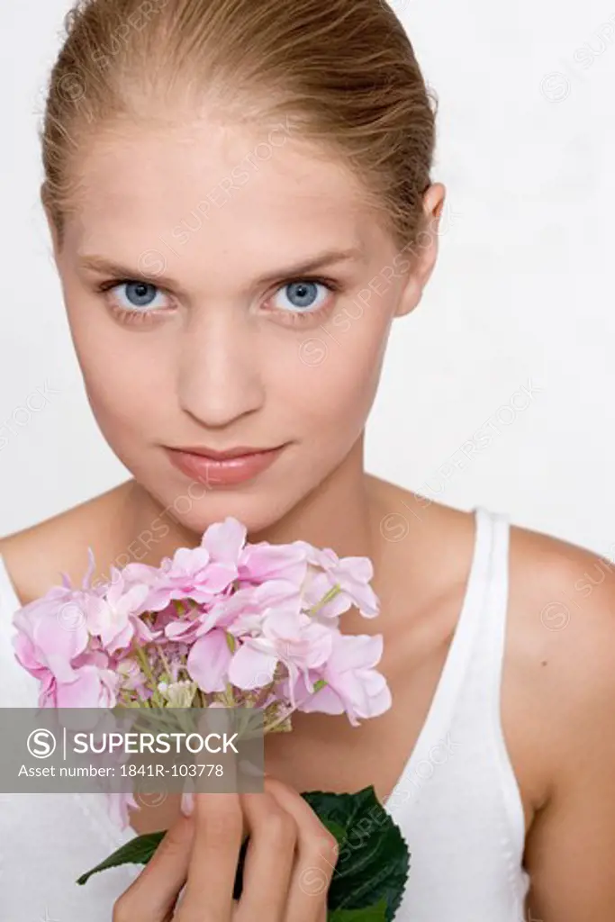 young woman with hydrangea