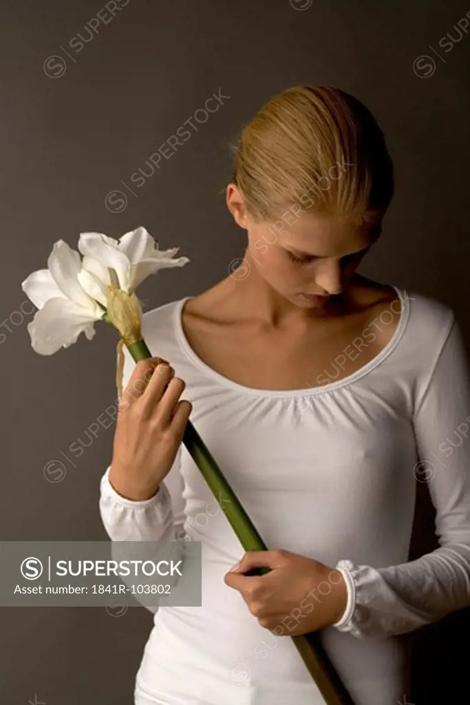 young woman with lily