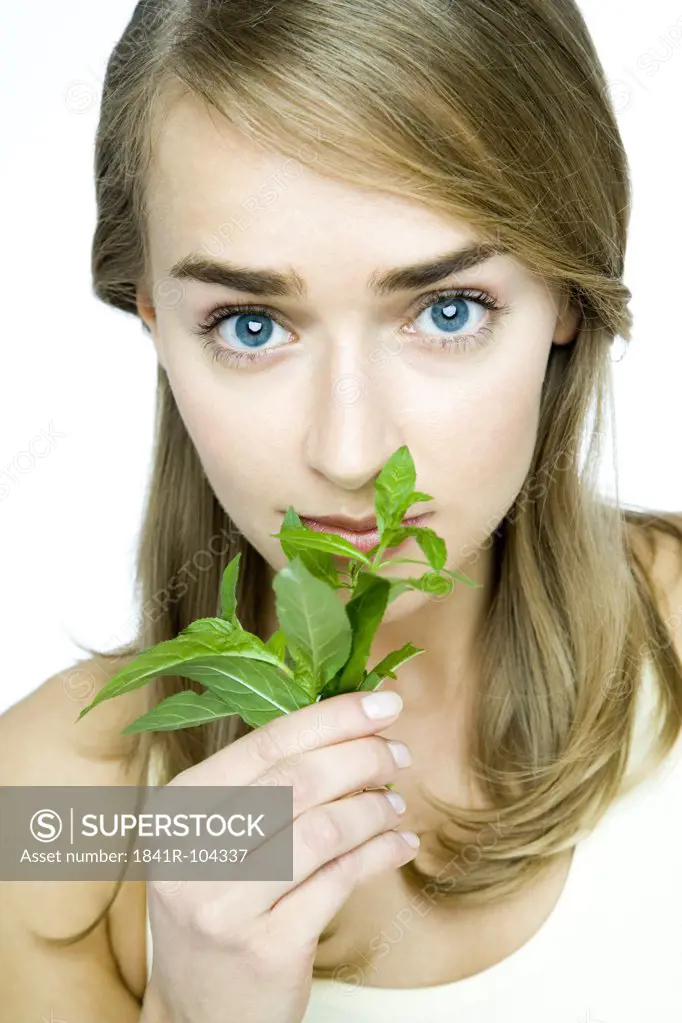 young woman with fresh mint