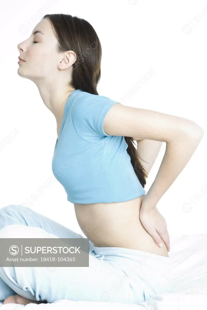 young woman with back pain