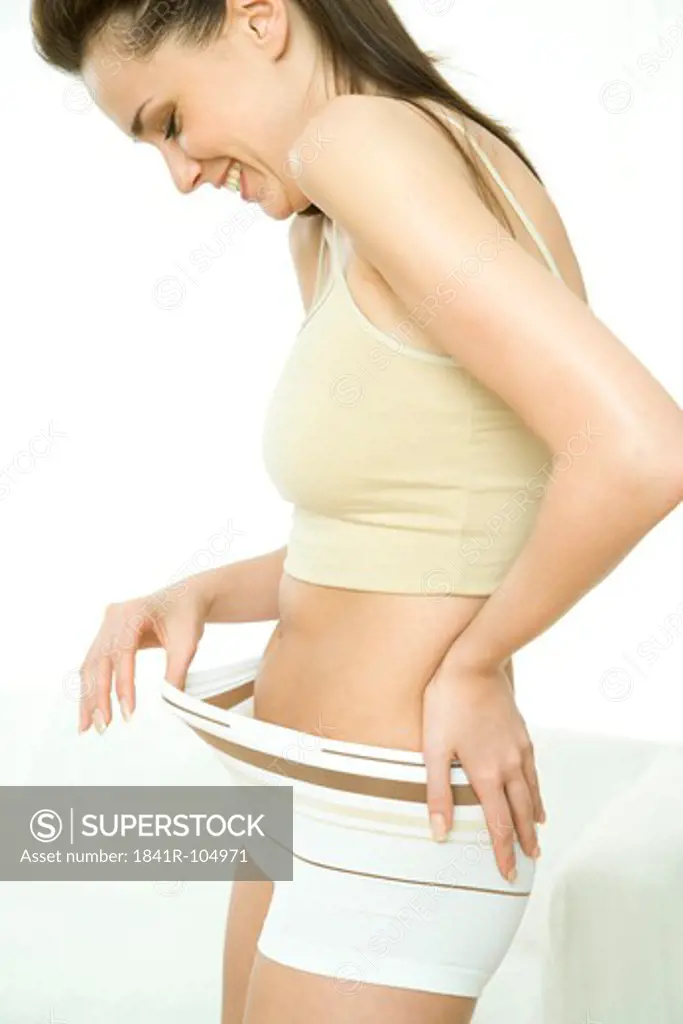woman checking her belly