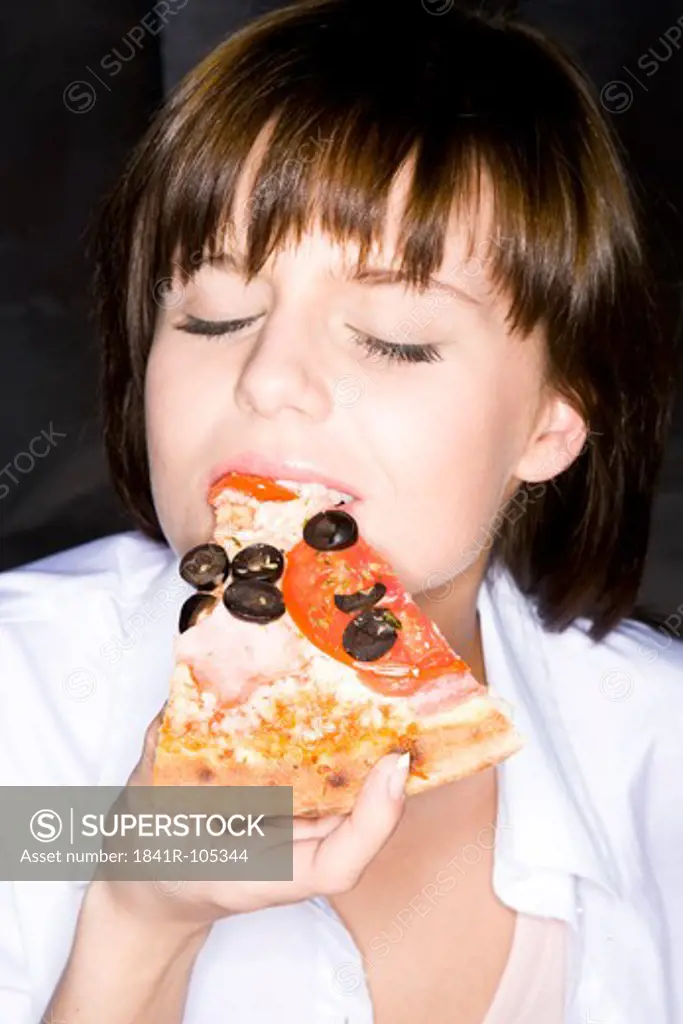 young woman with pizza piece