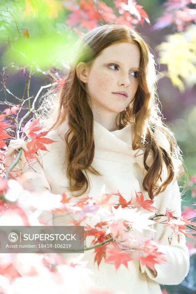 Autumn portrait of ginger woman