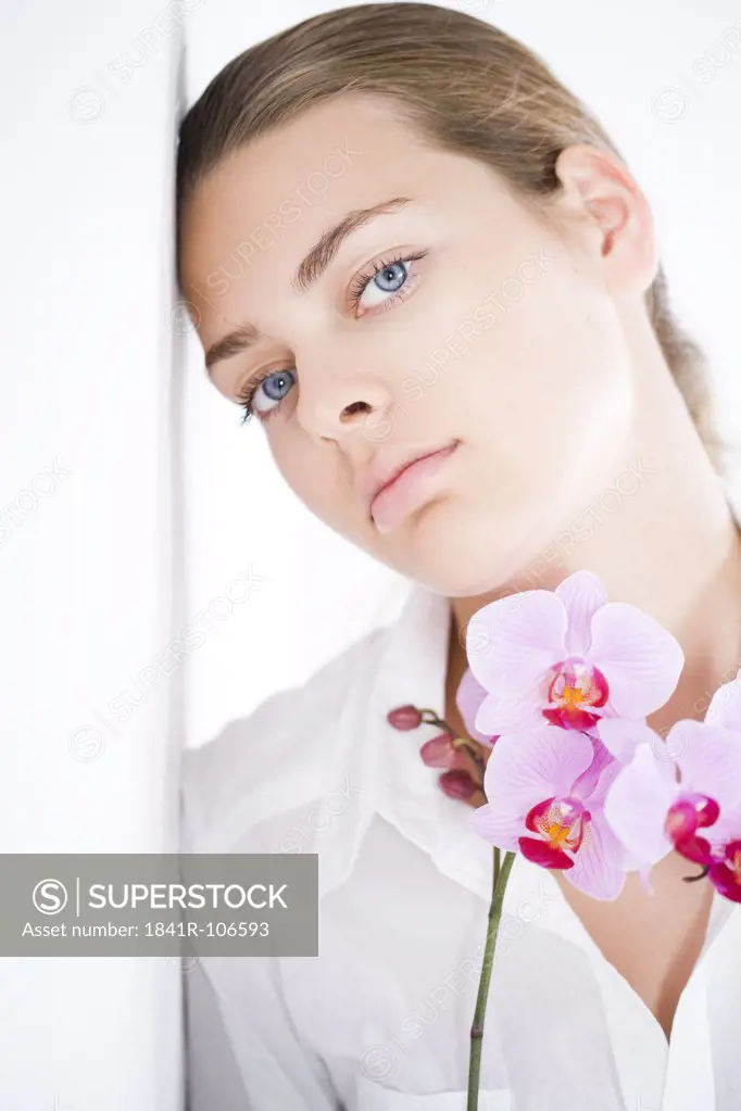 young woman with orchid