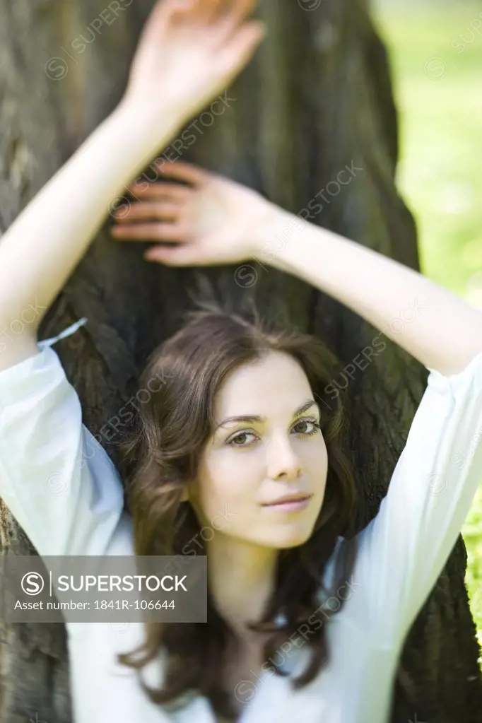 Girl resting under the tree