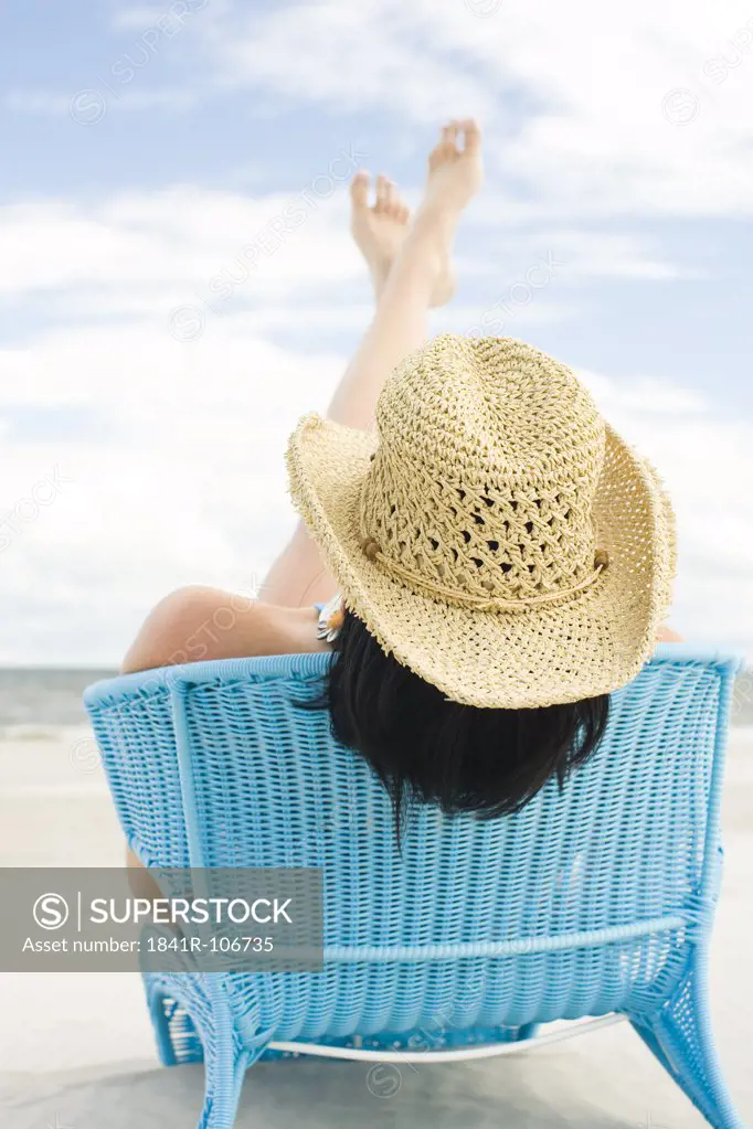 woman sunbathing on beach