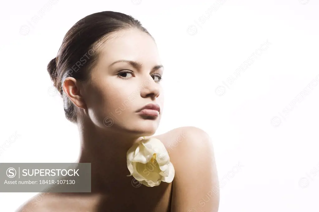 young woman with white tulip