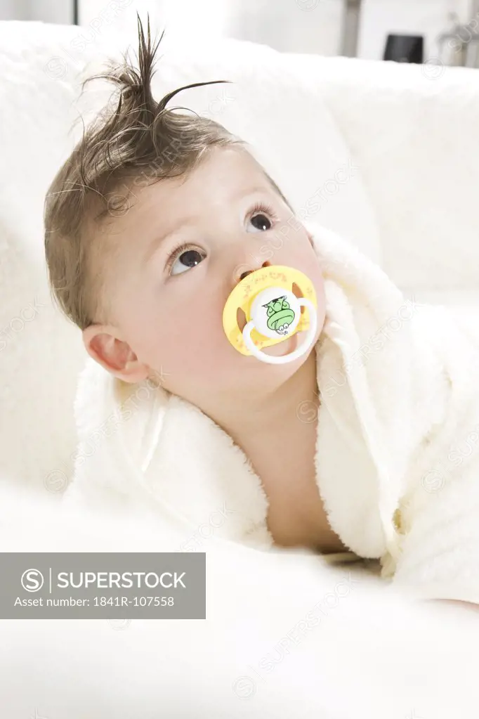 Baby in dressing gown after taking bath