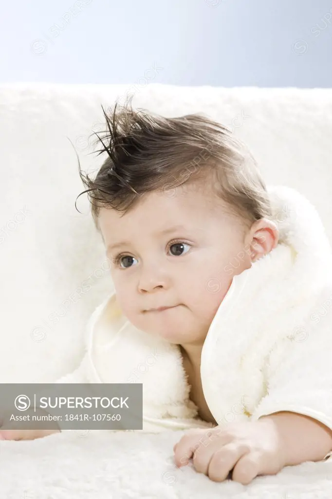 Baby in dressing gown after taking bath