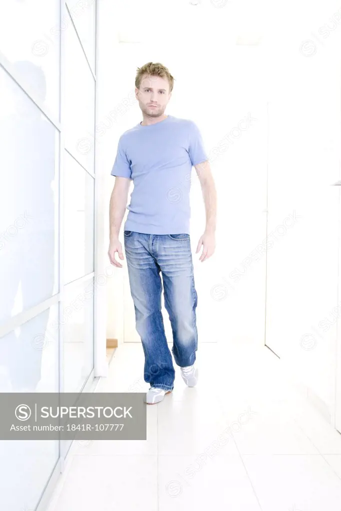 man standing in hall