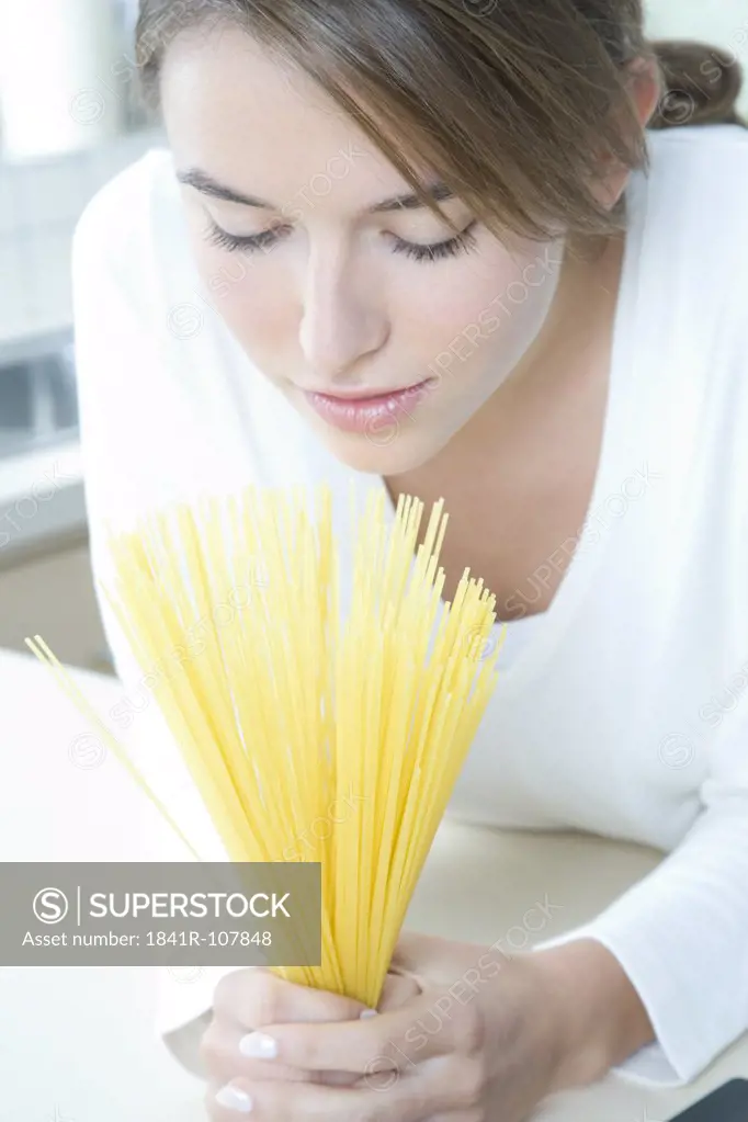 woman making spaghetti