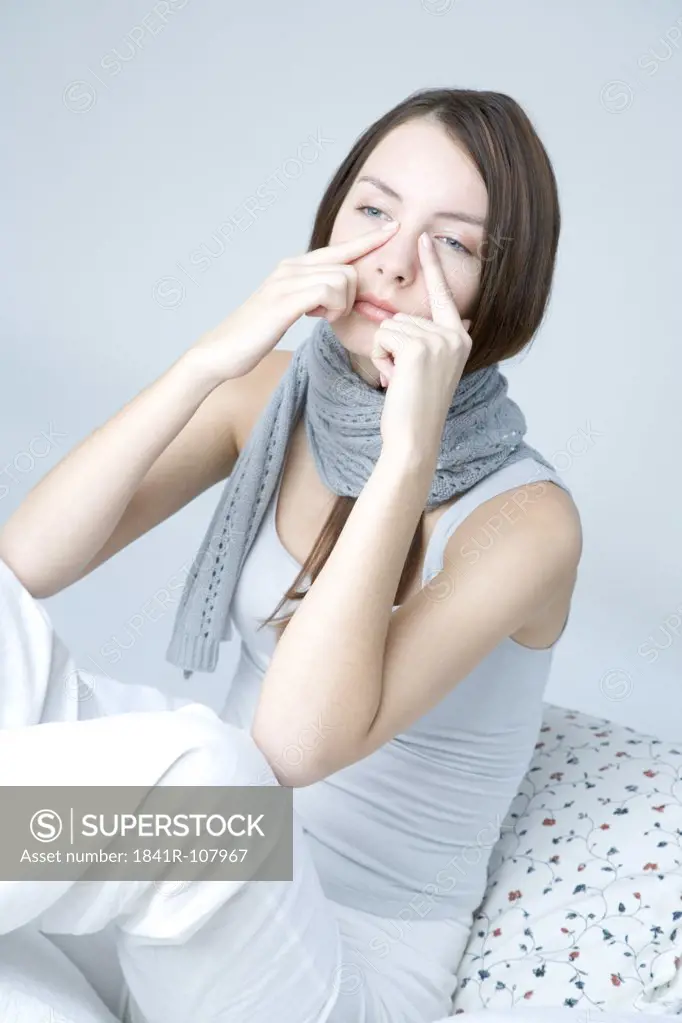young woman with sinuses pain