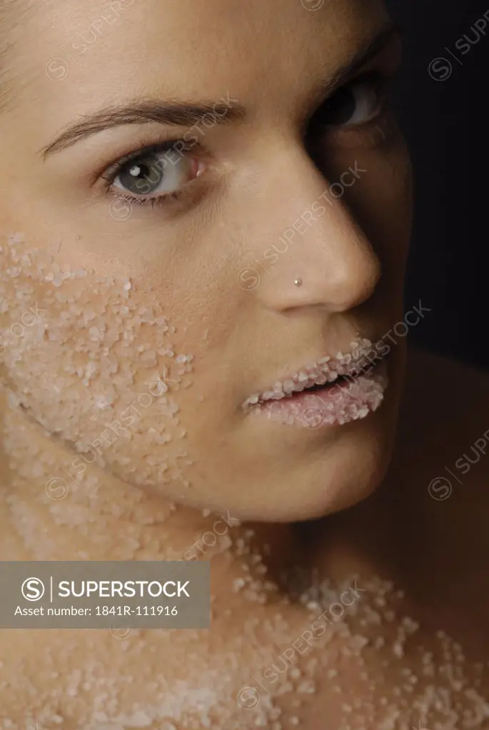 Natural cosmetics : salt  - face of a young woman