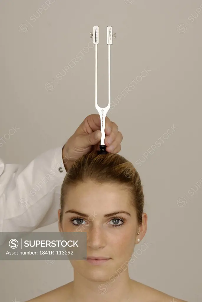 ENT ( ear , nose , throat ) : inspection of Weber ( lateralisation ) , with tuning fork