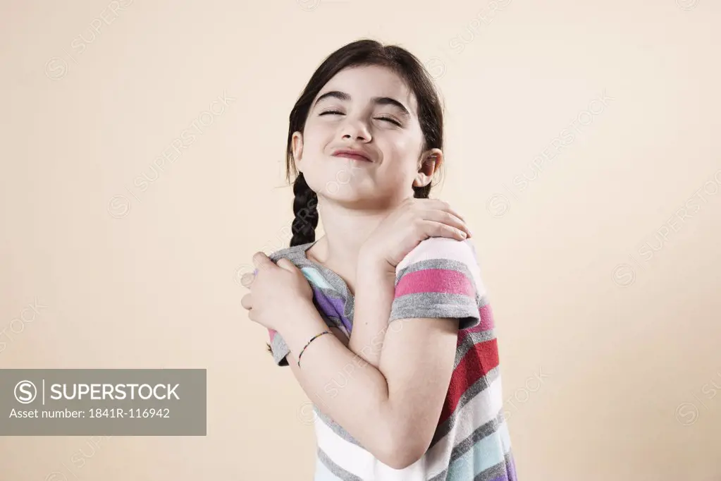 Girl with closed eyes posing