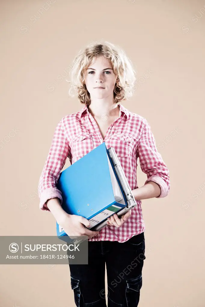 Teenage girl with folder