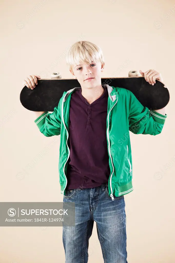 Blond boy with skateboard