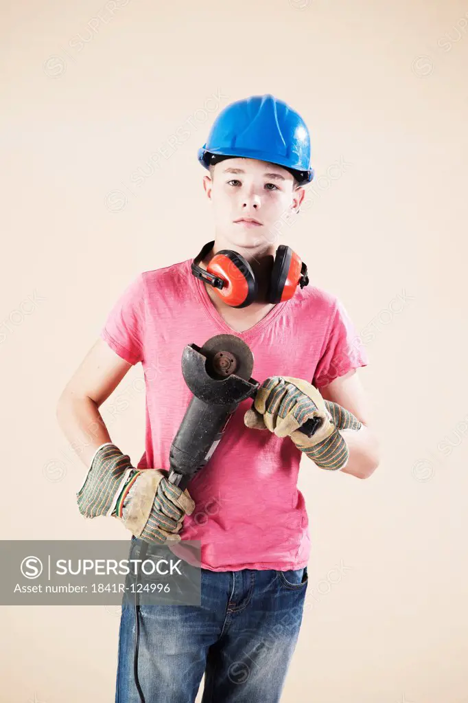 Teenage boy with hard helm and protective gloves