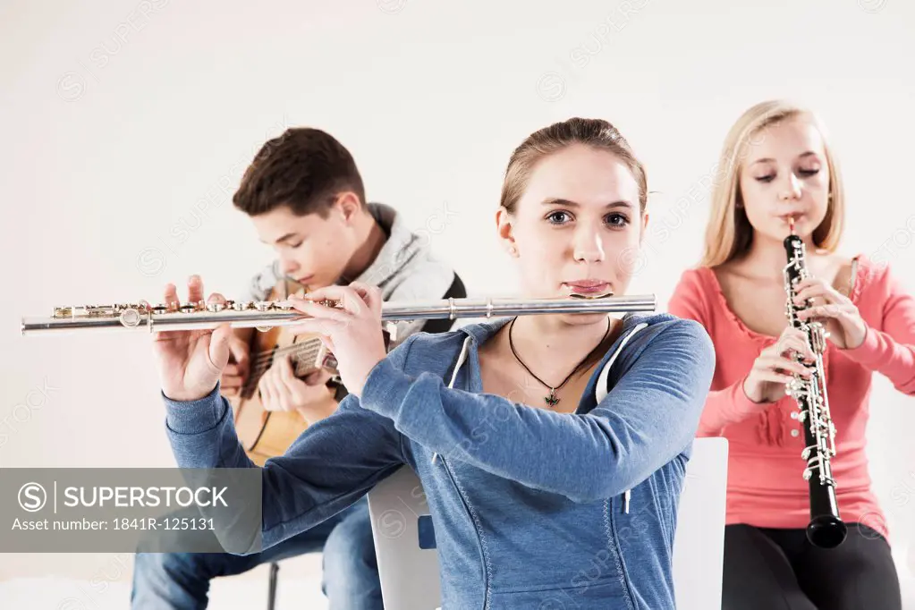 Teenager playing music