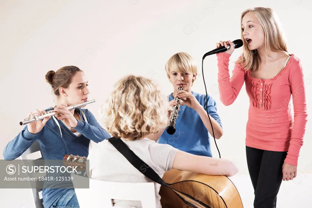 Teenager playing music
