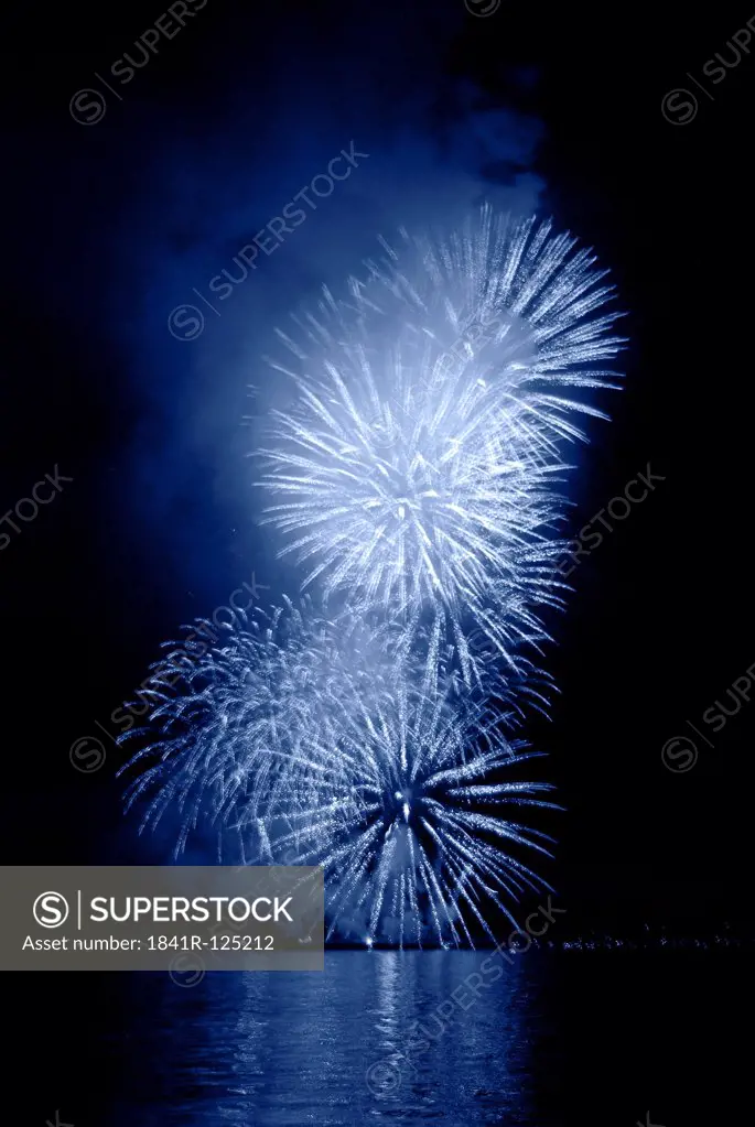 Firework display over water