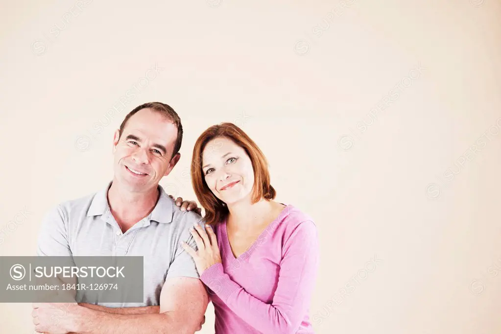 Couple laughing at camera