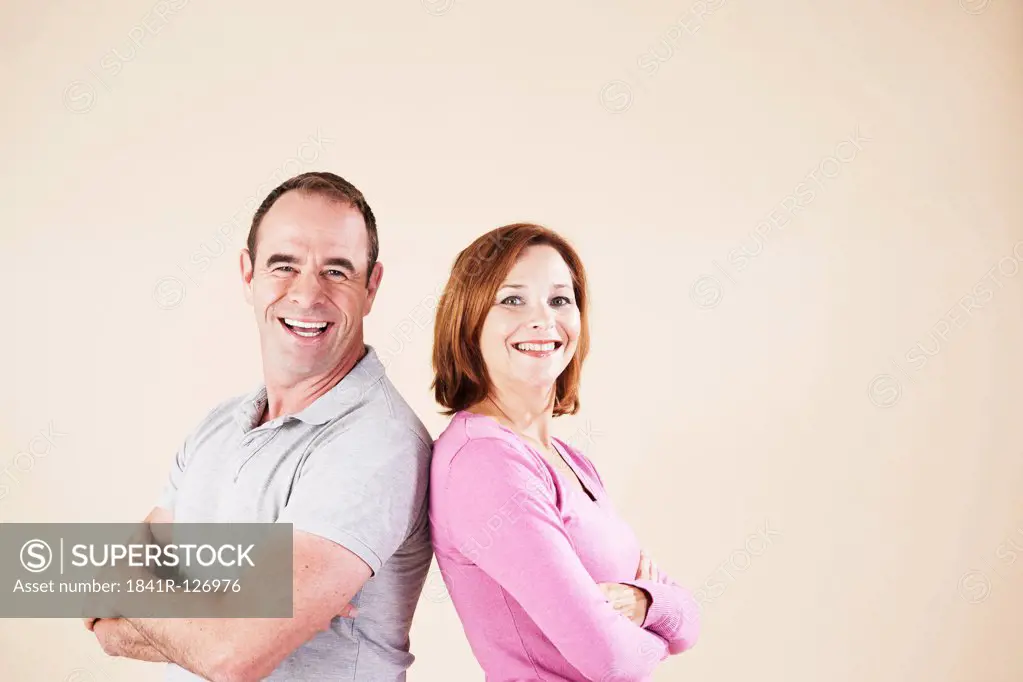 Couple laughing at camera
