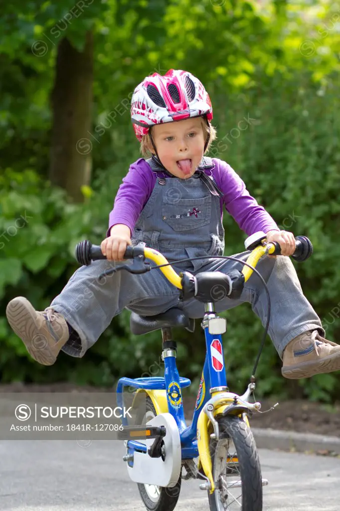 Mischievous toddler on a bike