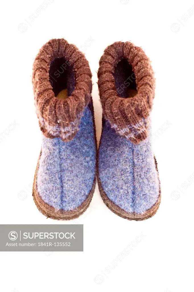 Children's felt slippers standing the wrong way round