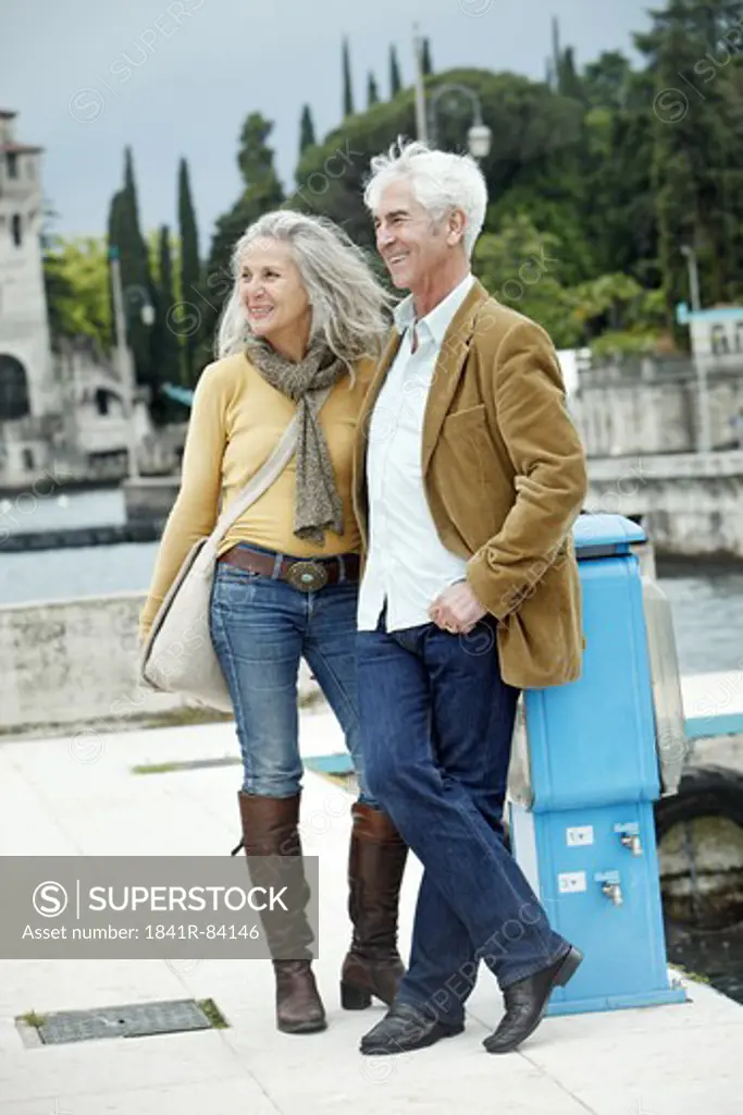 Senior couple standing outdoors, Italy