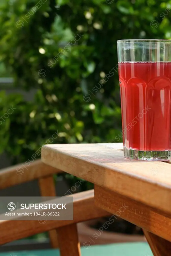 Close-up of glass of juice on table