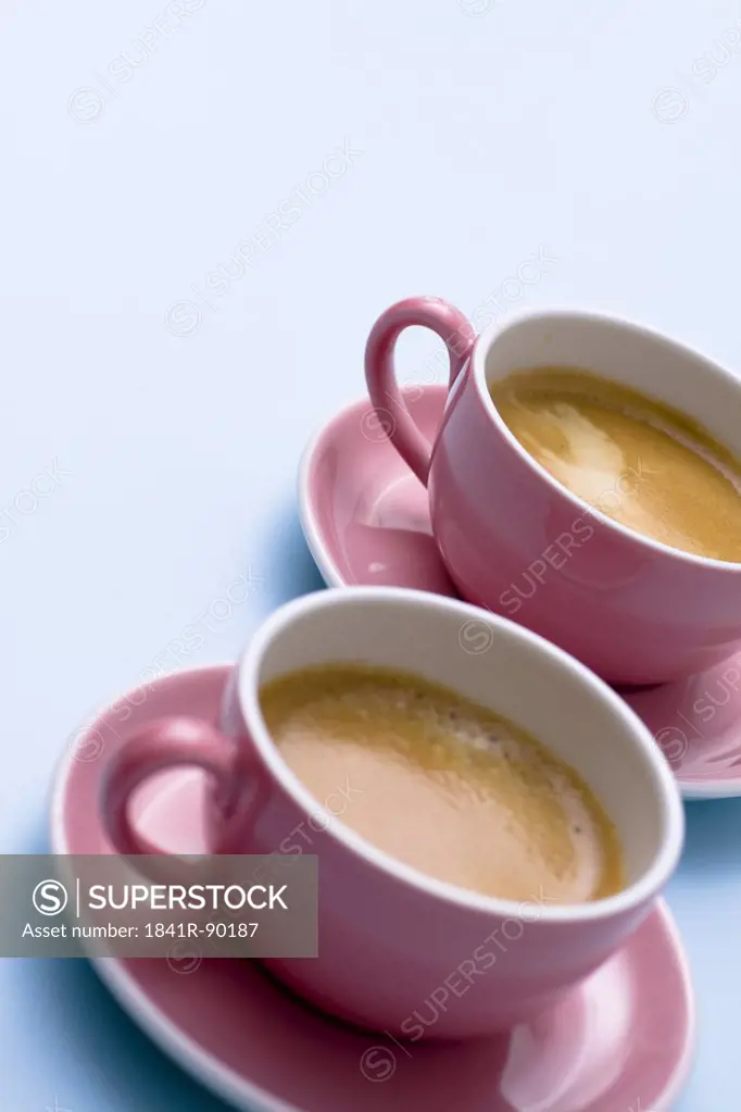 Close-up of two cups of tea on saucers